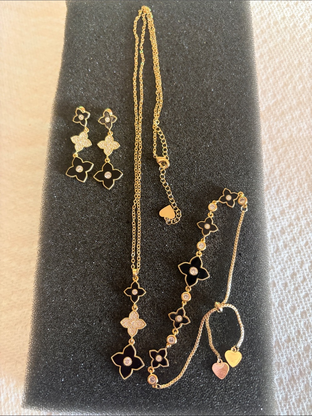 Gold and Black Floral Pendant Necklace and Bracelet Set
